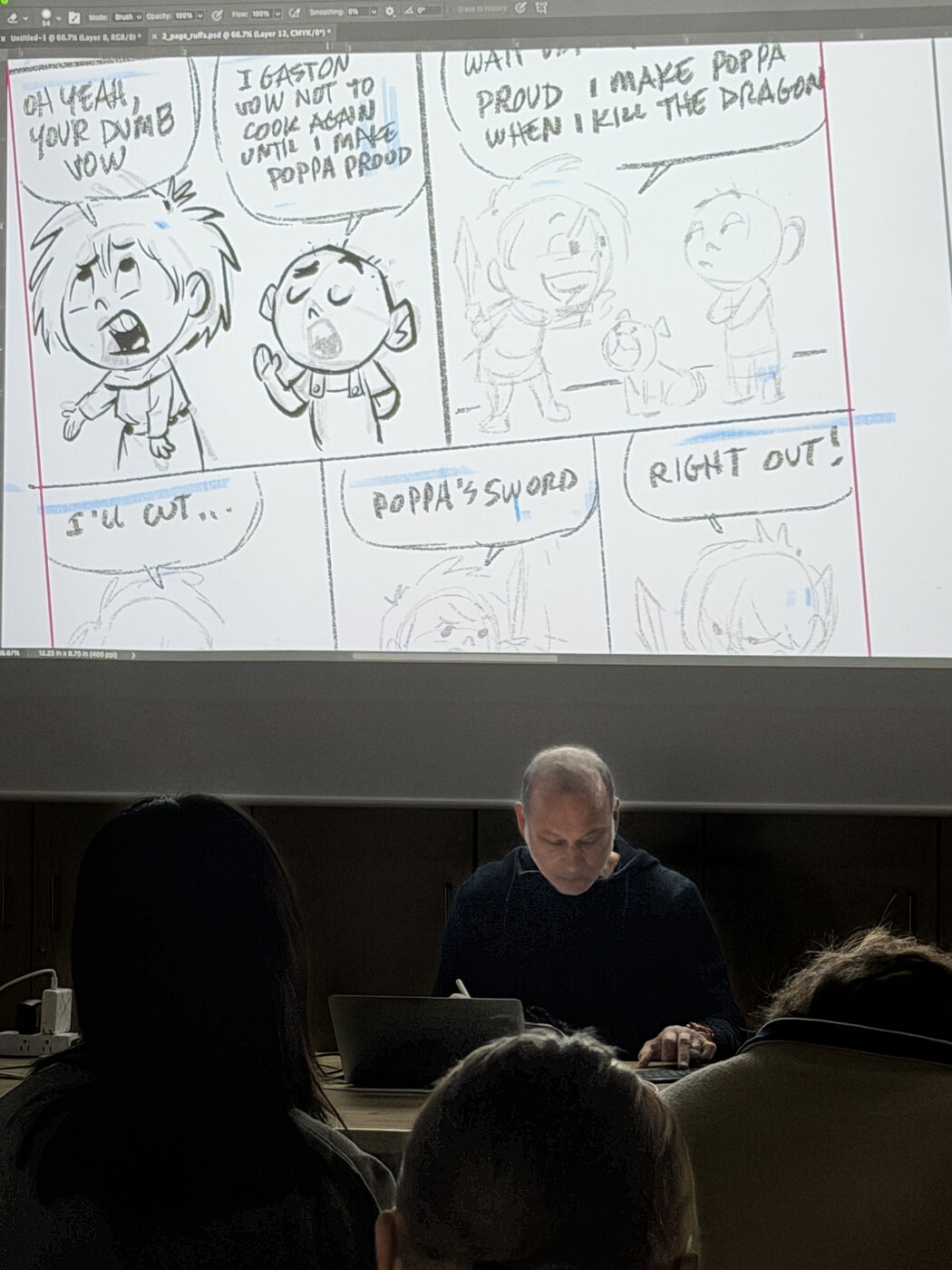 Rafael Rosado leading a live drawing demo at a school visit