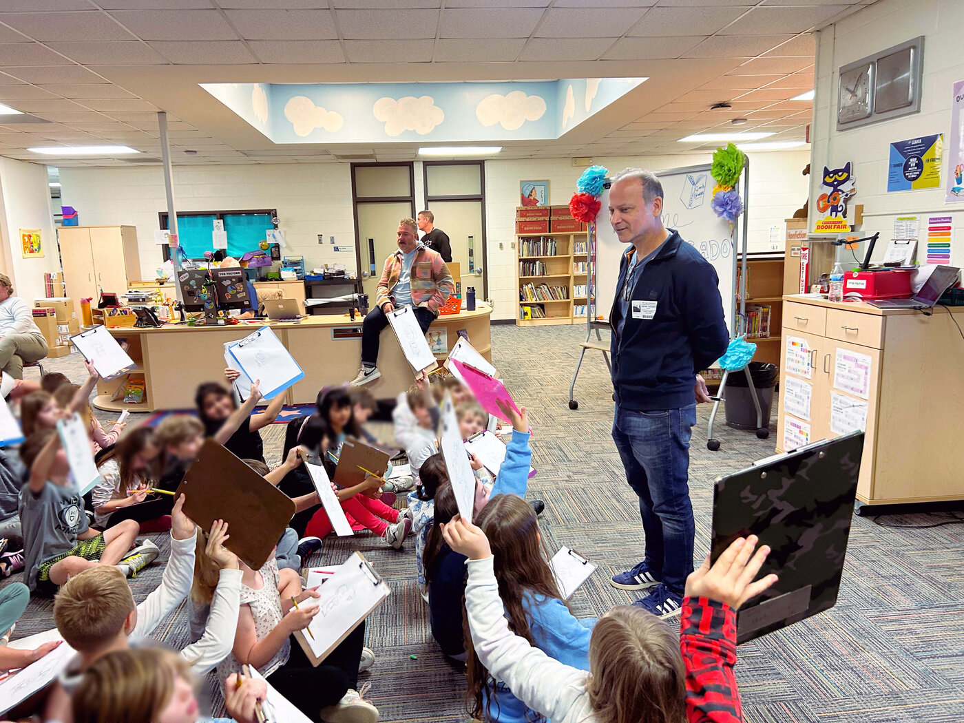 Rafael Rosado with students at a school visit